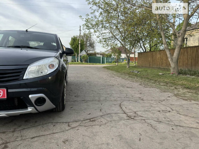 Сірий Дачія Sandero, об'ємом двигуна 1.4 л та пробігом 235 тис. км за 5590 $, фото 7 на Automoto.ua