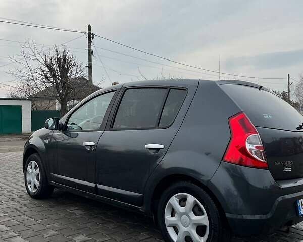 Сірий Дачія Sandero, об'ємом двигуна 1.4 л та пробігом 193 тис. км за 4200 $, фото 17 на Automoto.ua