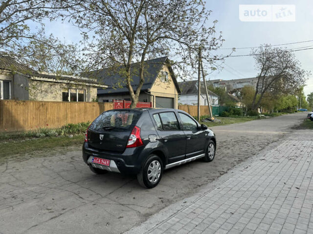 Сірий Дачія Sandero, об'ємом двигуна 1.4 л та пробігом 235 тис. км за 5590 $, фото 16 на Automoto.ua