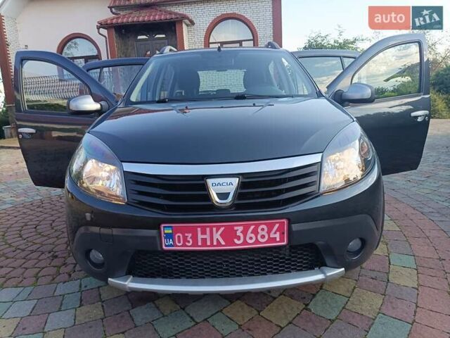 Сірий Дачія Sandero, об'ємом двигуна 1.6 л та пробігом 110 тис. км за 6990 $, фото 15 на Automoto.ua