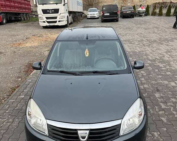 Сірий Дачія Sandero, об'ємом двигуна 1.4 л та пробігом 193 тис. км за 4200 $, фото 16 на Automoto.ua