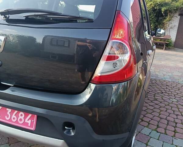 Сірий Дачія Sandero, об'ємом двигуна 1.6 л та пробігом 110 тис. км за 6990 $, фото 9 на Automoto.ua
