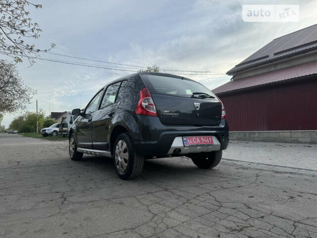 Сірий Дачія Sandero, об'ємом двигуна 1.4 л та пробігом 235 тис. км за 5590 $, фото 20 на Automoto.ua