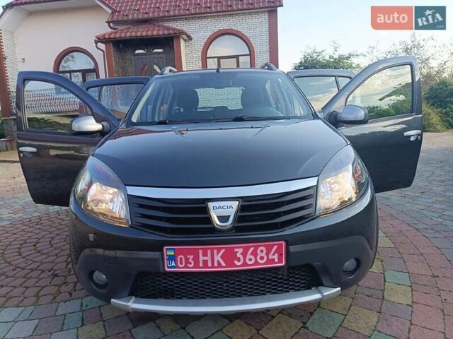 Сірий Дачія Sandero, об'ємом двигуна 1.6 л та пробігом 110 тис. км за 6990 $, фото 60 на Automoto.ua