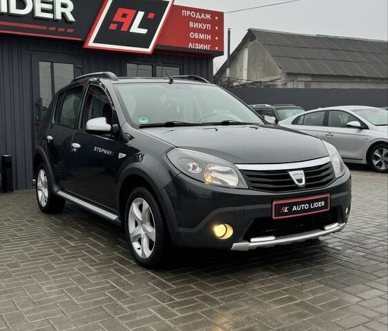 Серый Дачия Сандеро, объемом двигателя 1.6 л и пробегом 227 тыс. км за 7200 $, фото 1 на Automoto.ua