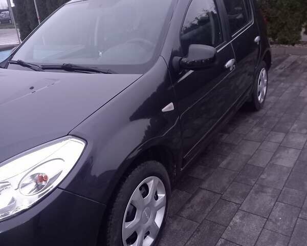 Серый Дачия Сандеро, объемом двигателя 1.6 л и пробегом 164 тыс. км за 4900 $, фото 2 на Automoto.ua