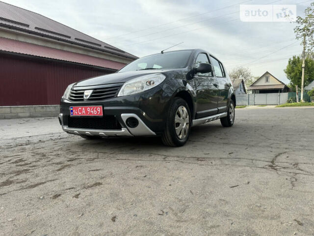 Сірий Дачія Sandero, об'ємом двигуна 1.4 л та пробігом 235 тис. км за 5590 $, фото 3 на Automoto.ua