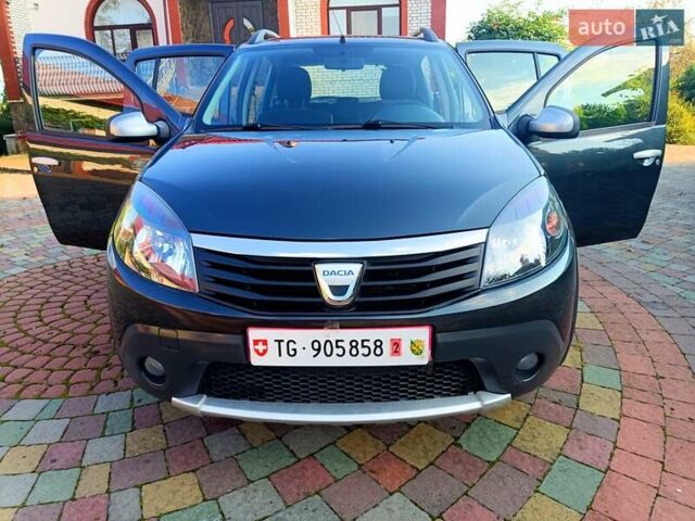 Сірий Дачія Sandero, об'ємом двигуна 1.6 л та пробігом 110 тис. км за 6990 $, фото 6 на Automoto.ua