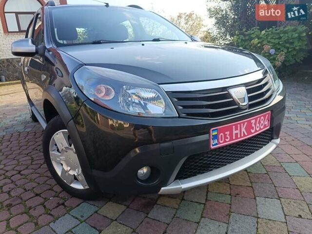 Сірий Дачія Sandero, об'ємом двигуна 1.6 л та пробігом 110 тис. км за 6990 $, фото 17 на Automoto.ua