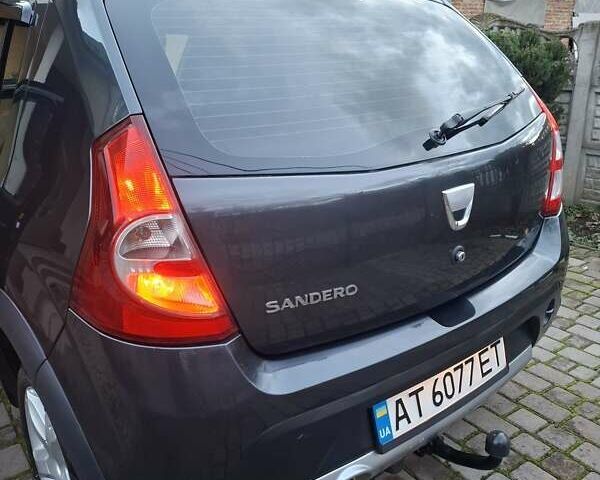 Серый Дачия Сандеро, объемом двигателя 1.6 л и пробегом 200 тыс. км за 6400 $, фото 7 на Automoto.ua