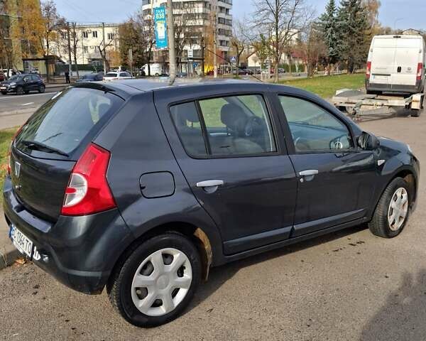 Сірий Дачія Sandero, об'ємом двигуна 1.6 л та пробігом 200 тис. км за 6200 $, фото 5 на Automoto.ua