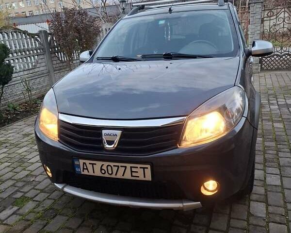 Серый Дачия Сандеро, объемом двигателя 1.6 л и пробегом 200 тыс. км за 6400 $, фото 6 на Automoto.ua