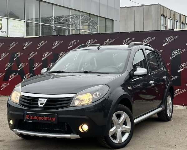 Серый Дачия Сандеро, объемом двигателя 1.6 л и пробегом 192 тыс. км за 6500 $, фото 3 на Automoto.ua