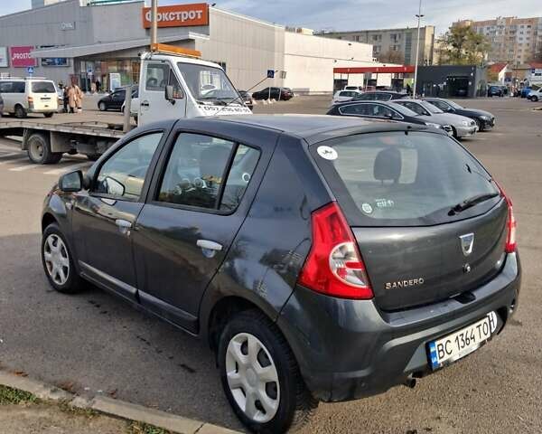 Сірий Дачія Sandero, об'ємом двигуна 1.6 л та пробігом 200 тис. км за 6200 $, фото 22 на Automoto.ua