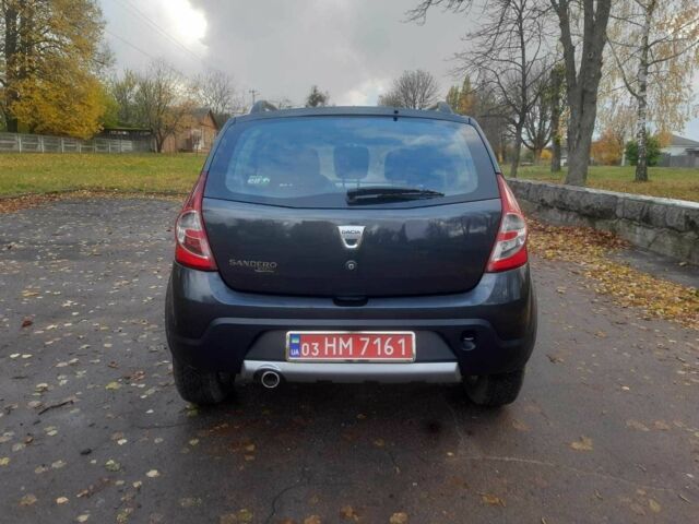 Дачия Сандеро 2010 в Кролевце на Automoto.ua Серый Дачия Сандеро, объемом двигателя 1.6 л и пробегом 230 тыс. км за 6800 $, фото 6 на Automoto.ua