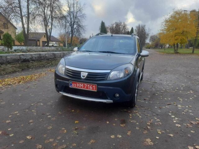 Дачия Сандеро 2010 в Кролевце на Automoto.ua Серый Дачия Сандеро, объемом двигателя 1.6 л и пробегом 230 тыс. км за 6800 $, фото 9 на Automoto.ua