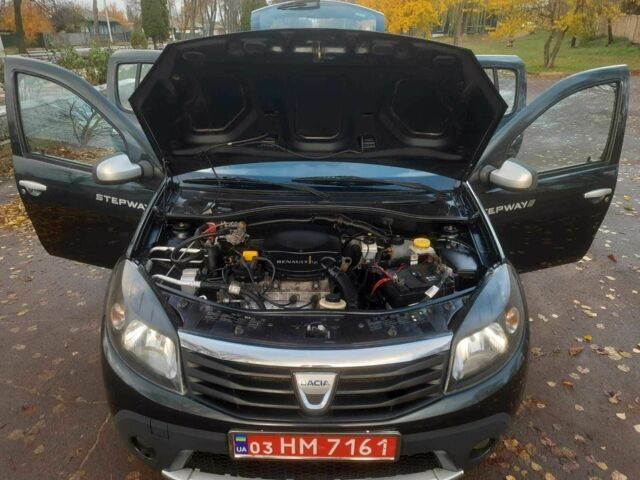 Дачия Сандеро 2010 в Кролевце на Automoto.ua Серый Дачия Сандеро, объемом двигателя 1.6 л и пробегом 230 тыс. км за 6800 $, фото 11 на Automoto.ua