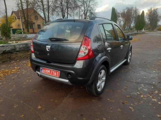 Дачия Сандеро 2010 в Кролевце на Automoto.ua Серый Дачия Сандеро, объемом двигателя 1.6 л и пробегом 230 тыс. км за 6800 $, фото 7 на Automoto.ua