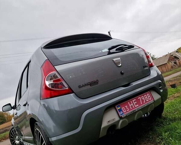 Сірий Дачія Sandero, об'ємом двигуна 1.6 л та пробігом 142 тис. км за 5599 $, фото 7 на Automoto.ua