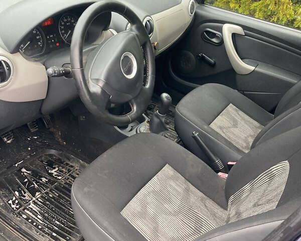 Синий Дачия Сандеро, объемом двигателя 1.39 л и пробегом 184 тыс. км за 3100 $, фото 6 на Automoto.ua