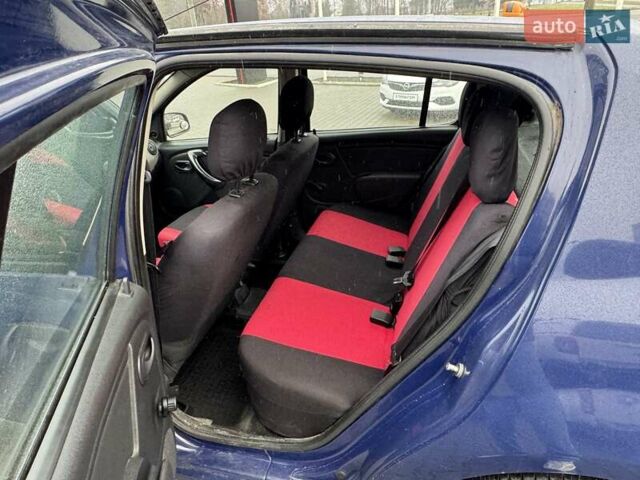 Синій Дачія Sandero, об'ємом двигуна 1.15 л та пробігом 155 тис. км за 3299 $, фото 7 на Automoto.ua