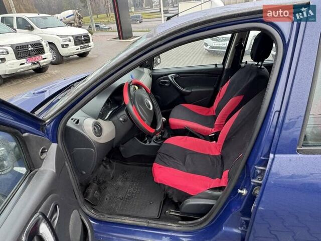 Синій Дачія Sandero, об'ємом двигуна 1.15 л та пробігом 155 тис. км за 3299 $, фото 8 на Automoto.ua