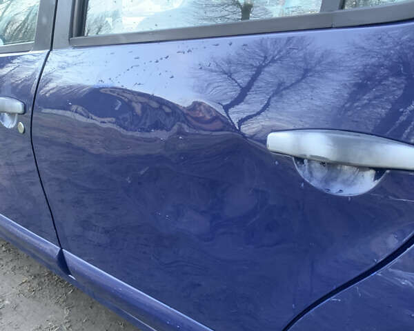 Синій Дачія Sandero, об'ємом двигуна 1.39 л та пробігом 315 тис. км за 2850 $, фото 16 на Automoto.ua
