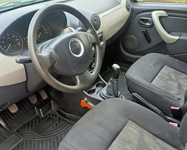 Синий Дачия Сандеро, объемом двигателя 1.1 л и пробегом 202 тыс. км за 3800 $, фото 4 на Automoto.ua