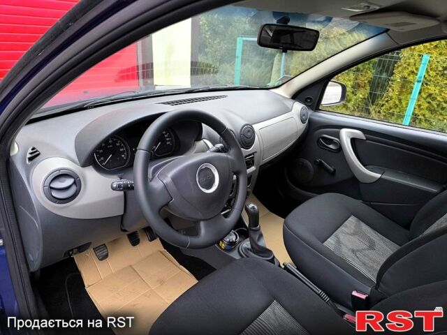 Синий Дачия Сандеро, объемом двигателя 14 л и пробегом 167 тыс. км за 4800 $, фото 6 на Automoto.ua