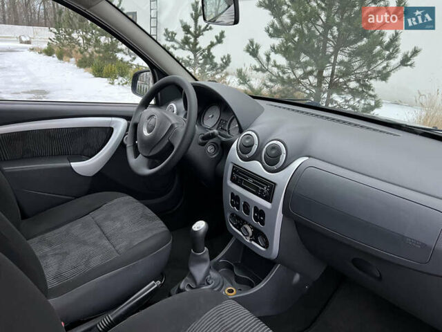 Синий Дачия Сандеро, объемом двигателя 1.4 л и пробегом 213 тыс. км за 4850 $, фото 49 на Automoto.ua