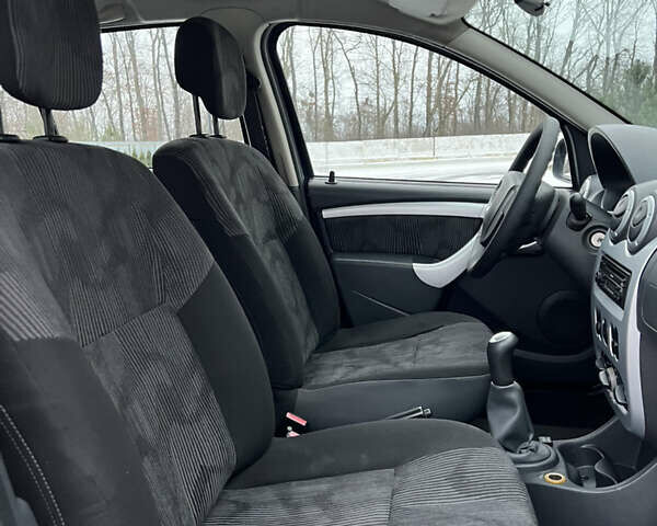 Синий Дачия Сандеро, объемом двигателя 1.4 л и пробегом 213 тыс. км за 4850 $, фото 52 на Automoto.ua