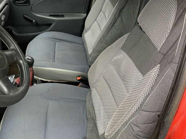 Червоний Дачія Solenza, об'ємом двигуна 1.4 л та пробігом 470 тис. км за 1100 $, фото 7 на Automoto.ua