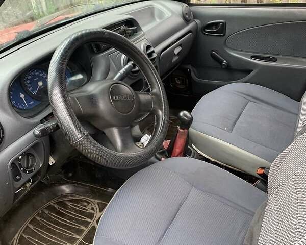 Червоний Дачія Solenza, об'ємом двигуна 1.4 л та пробігом 470 тис. км за 1100 $, фото 7 на Automoto.ua