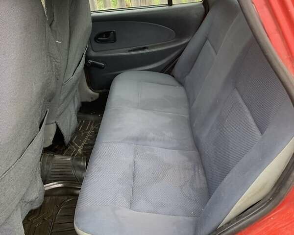 Червоний Дачія Solenza, об'ємом двигуна 1.4 л та пробігом 470 тис. км за 1100 $, фото 10 на Automoto.ua