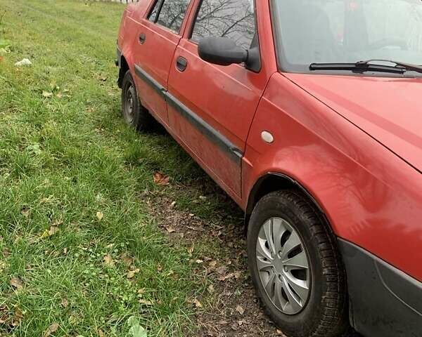 Червоний Дачія Solenza, об'ємом двигуна 1.4 л та пробігом 470 тис. км за 1100 $, фото 1 на Automoto.ua