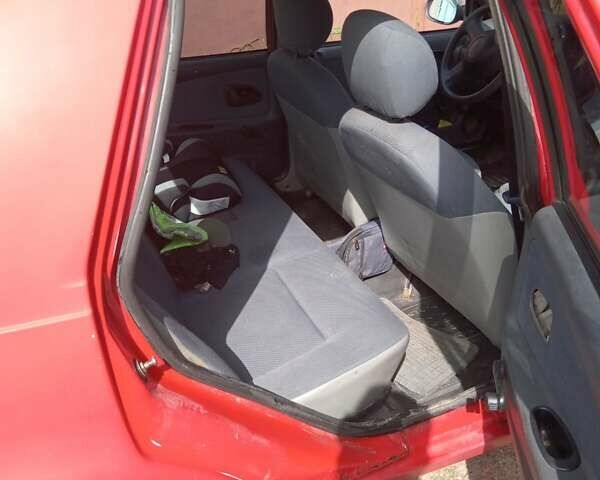 Червоний Дачія Solenza, об'ємом двигуна 1.4 л та пробігом 200 тис. км за 1100 $, фото 7 на Automoto.ua