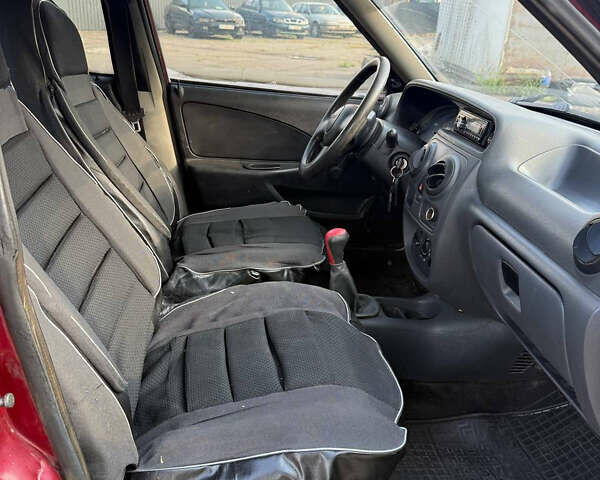 Червоний Дачія Solenza, об'ємом двигуна 1.4 л та пробігом 250 тис. км за 850 $, фото 8 на Automoto.ua