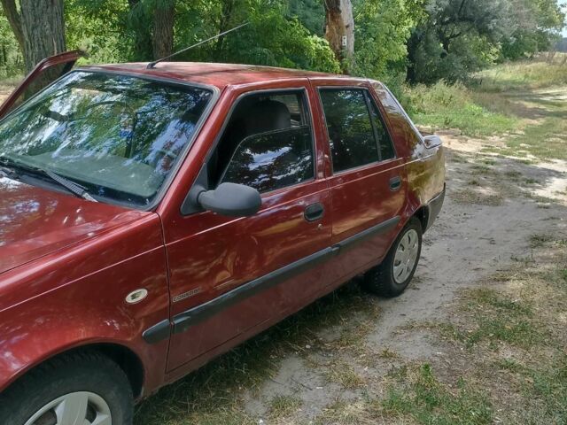 Червоний Дачія Solenza, об'ємом двигуна 1.4 л та пробігом 140 тис. км за 1900 $, фото 1 на Automoto.ua