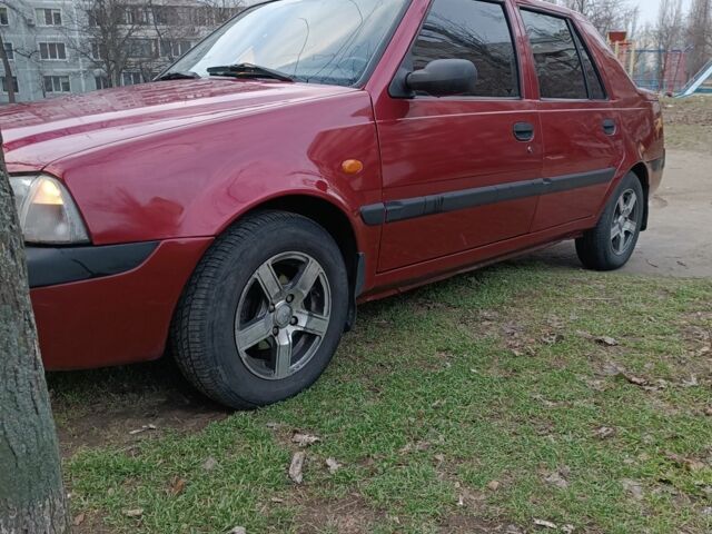 Червоний Дачія Solenza, об'ємом двигуна 1.4 л та пробігом 197 тис. км за 1600 $, фото 1 на Automoto.ua