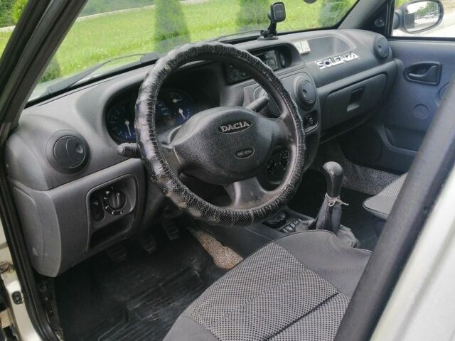 Сірий Дачія Solenza, об'ємом двигуна 1.4 л та пробігом 197 тис. км за 1500 $, фото 10 на Automoto.ua