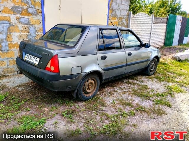 Сірий Дачія Solenza, об'ємом двигуна 1.4 л та пробігом 200 тис. км за 1250 $, фото 1 на Automoto.ua