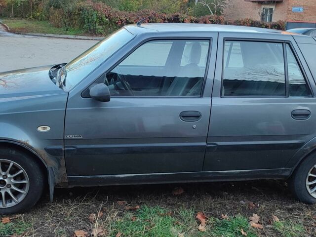 Сірий Дачія Solenza, об'ємом двигуна 1.4 л та пробігом 137 тис. км за 1191 $, фото 1 на Automoto.ua