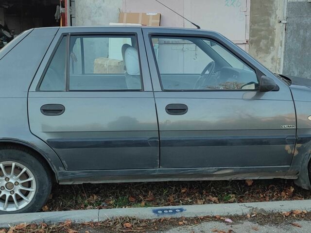 Сірий Дачія Solenza, об'ємом двигуна 1.4 л та пробігом 137 тис. км за 1191 $, фото 2 на Automoto.ua