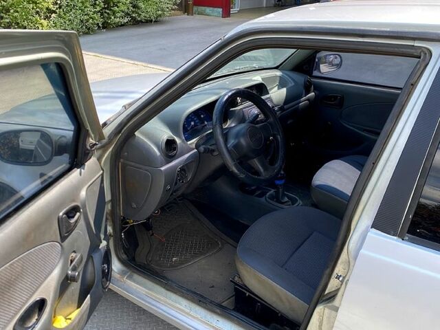 Серый Дачия Соленза, объемом двигателя 1.4 л и пробегом 242 тыс. км за 1100 $, фото 4 на Automoto.ua