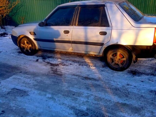 Сірий Дачія Solenza, об'ємом двигуна 1.4 л та пробігом 240 тис. км за 1300 $, фото 1 на Automoto.ua