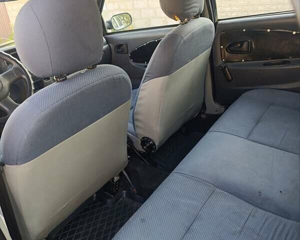 Синий Дачия Соленза, объемом двигателя 1.4 л и пробегом 182 тыс. км за 900 $, фото 2 на Automoto.ua