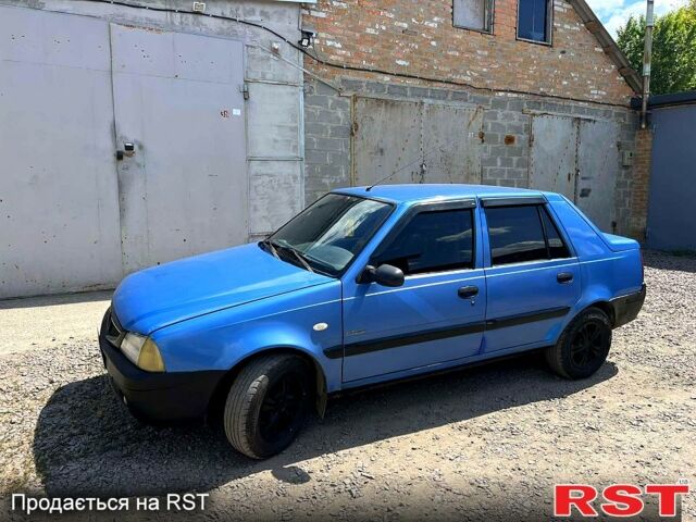 Синий Дачия Соленза, объемом двигателя 1.4 л и пробегом 265 тыс. км за 1600 $, фото 3 на Automoto.ua