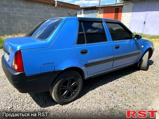 Синий Дачия Соленза, объемом двигателя 1.4 л и пробегом 265 тыс. км за 1600 $, фото 2 на Automoto.ua