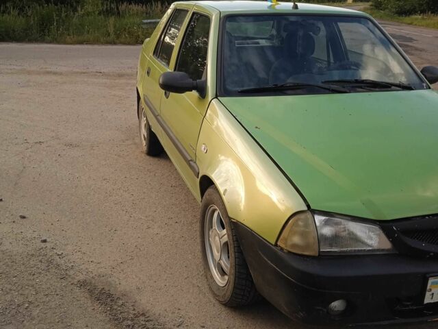 Зелений Дачія Solenza, об'ємом двигуна 1.4 л та пробігом 250 тис. км за 1550 $, фото 4 на Automoto.ua