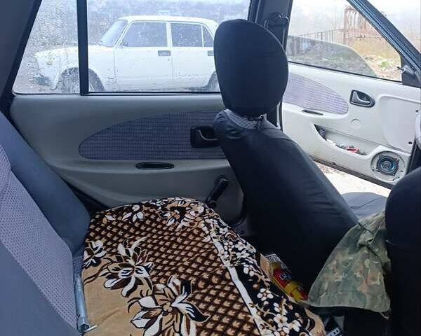 Зелений Дачія Solenza, об'ємом двигуна 1.4 л та пробігом 90 тис. км за 1600 $, фото 10 на Automoto.ua